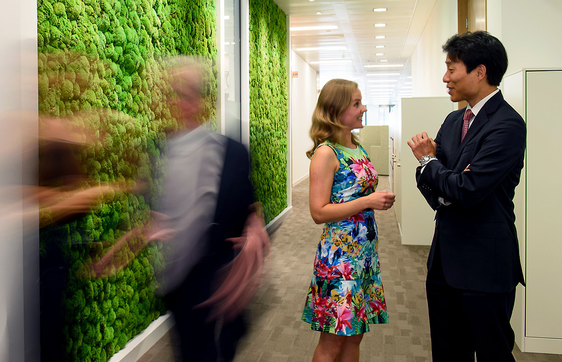 EBRD staff talking in the office