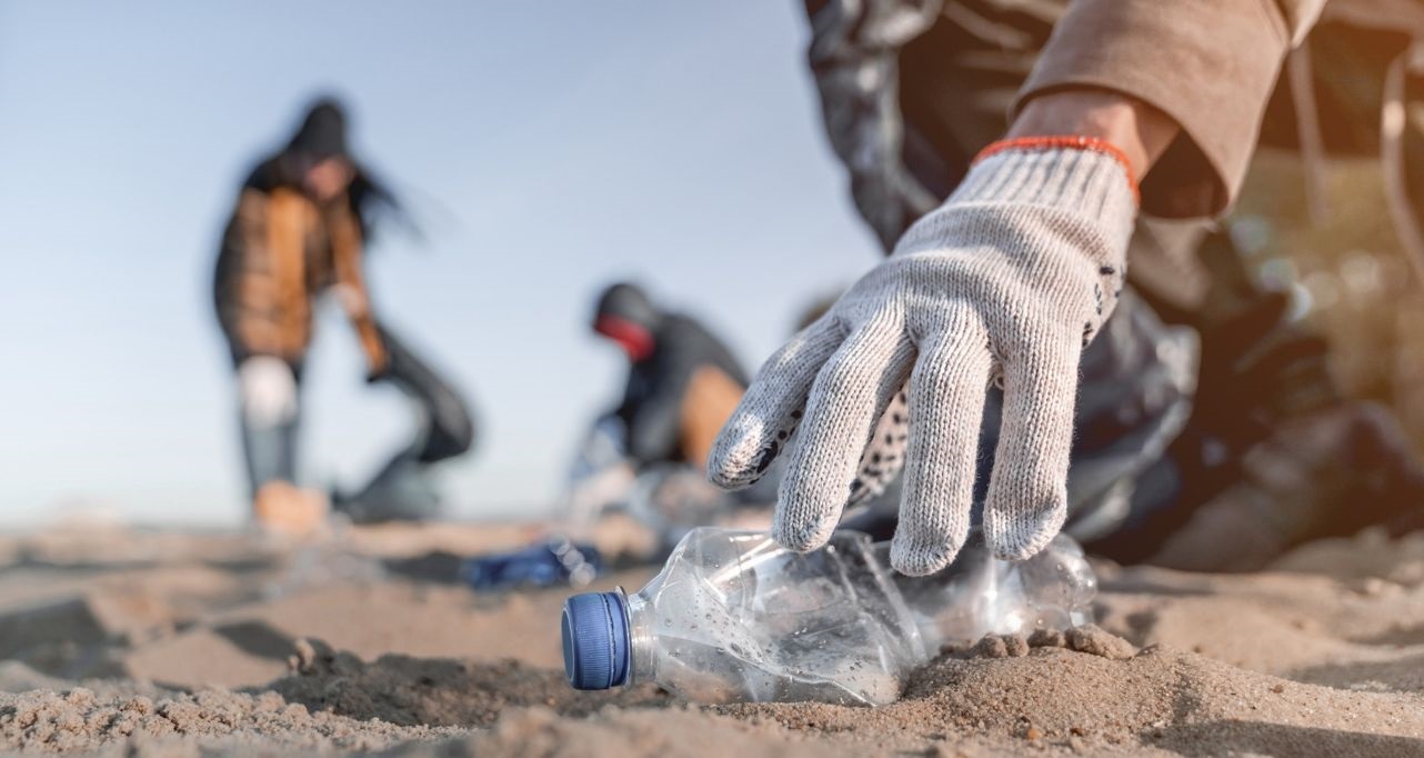Volunteers collecting plastic from the beach